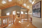 Grand View Lodge loft with wood  ceiloings. 